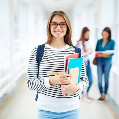 Happy female student at one of the best universities